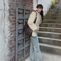 Son Yeon-jae Reveals Winter Fashion Look with Fleece and Red Accents