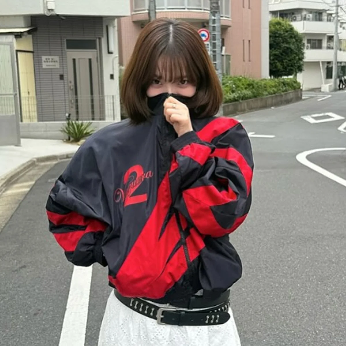 Karina faced controversy after posting photos on May 27, taken in Japan, with a rose emoji